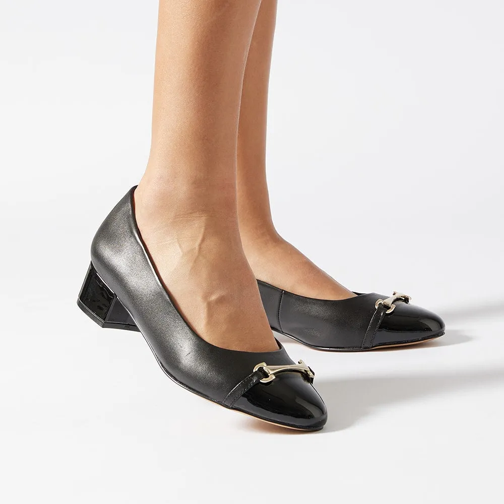 Rita Heel in Black On Black Leather