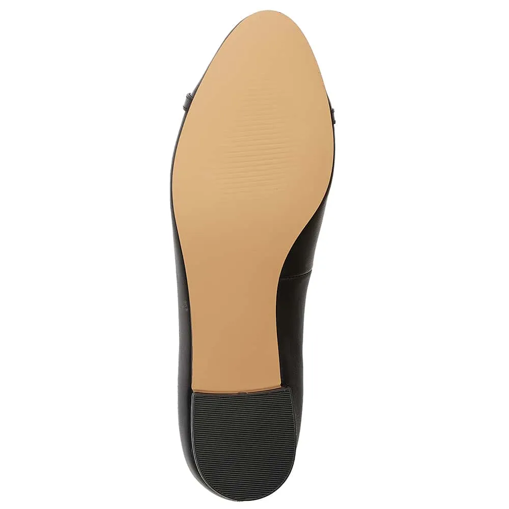 Rita Heel in Black On Black Leather
